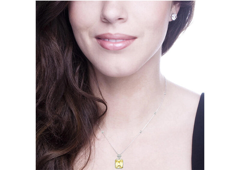 Silver Fancy Light Yellow Emerald Cut Station Necklace with 18 KGP Prongs by Bling