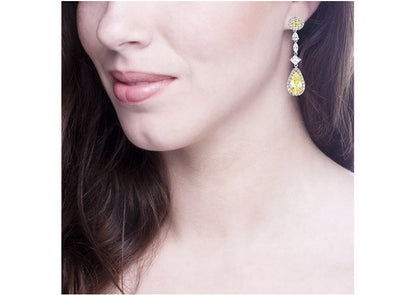 Silver Fancy Light Yellow Regal Teardrops with 18 KGP Prongs by Bling