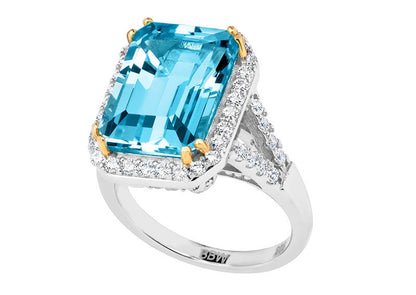 Sterling Silver 8 Carat Blue Topaz Emerald Cut Ring with 18 KGP Prongs by Bling