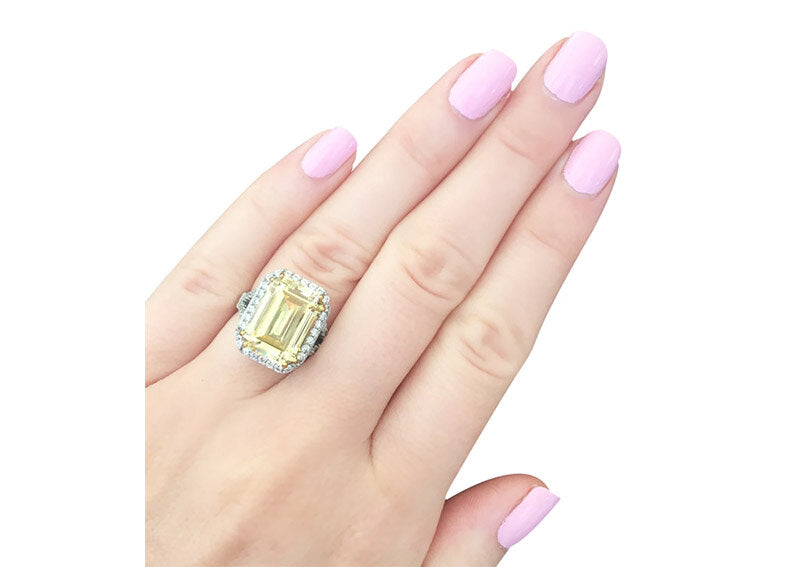 Sterling Silver 8 Carat Fancy Light Yellow Emerald Cut Ring with 18 KGP Prongs by Bling