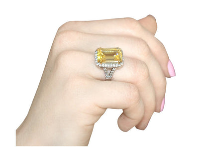 Sterling Silver 8 Carat Fancy Light Yellow Emerald Cut Ring with 18 KGP Prongs by Bling